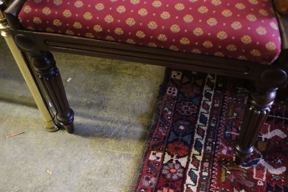 A William IV scroll arm elbow chair